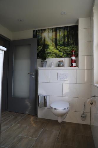 Ένα μπάνιο στο Komfortable Ferienwohnung in der Lüneburger Heide