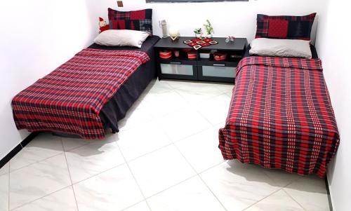 Ein Bett oder Betten in einem Zimmer der Unterkunft Dar Shama - Women only