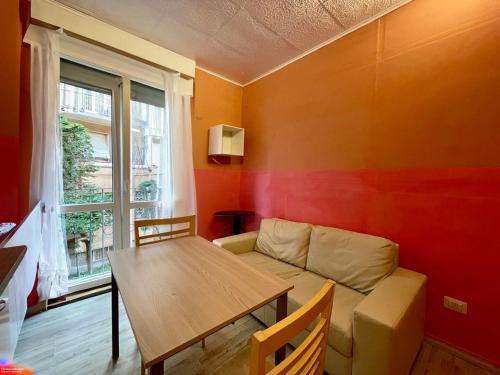 Area soggiorno di The Orange Housing in Como