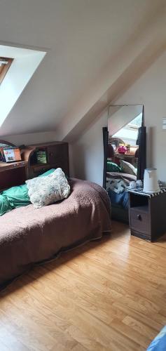Postel nebo postele na pokoji v ubytování Chez Brigitte