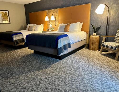 Ein Bett oder Betten in einem Zimmer der Unterkunft Riverhouse Lodge