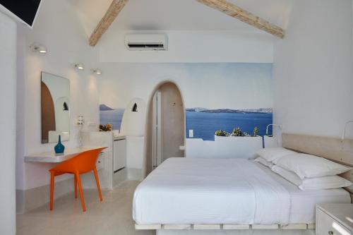 A bed or beds in a room at Kouros Village Hotel - Adults Only