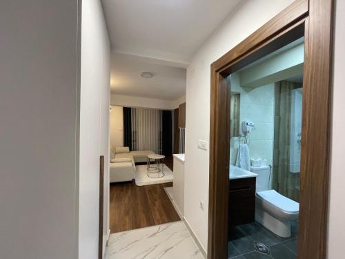 a bathroom with a toilet and a sink at Skopje Kale Luxury Apartment in Skopje