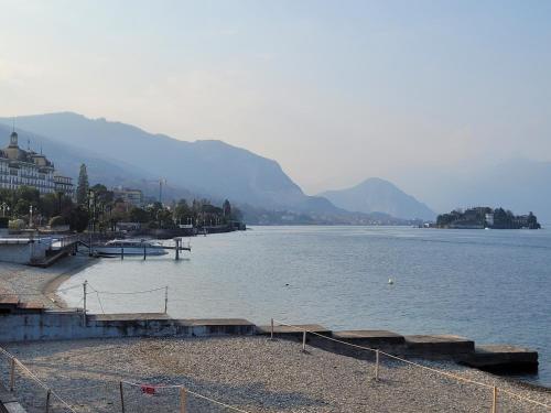 a large body of water with mountains in the background at Al Dolce Vita in Stresa