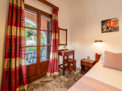 Ένα ή περισσότερα κρεβάτια σε δωμάτιο στο XENOFONTAS APARTMENTs