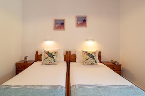 Ένα ή περισσότερα κρεβάτια σε δωμάτιο στο XENOFONTAS APARTMENTs