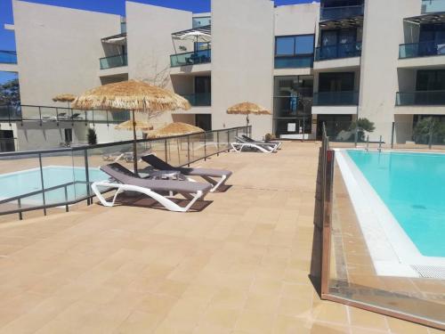 Kolam renang di atau dekat dengan Ocean View Penthouse El Cotillo