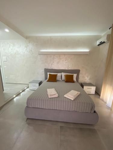 Postel nebo postele na pokoji v ubytování B&B via Oliviero