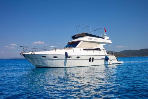 a white boat in the water on the ocean at Azul Yachting in Bodrum City