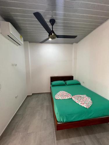 Postel nebo postele na pokoji v ubytování Acogedor apartamento en Puerto Triunfo - Antioquia.