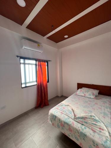 Postel nebo postele na pokoji v ubytování Acogedor apartamento en Puerto Triunfo - Antioquia.