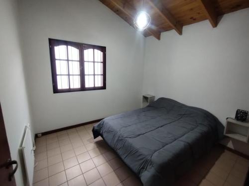 Postel nebo postele na pokoji v ubytování Casa residencial con pileta