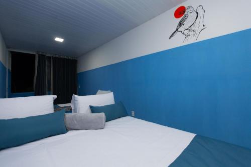 Een bed of bedden in een kamer bij Bela Villa Eco Pousada