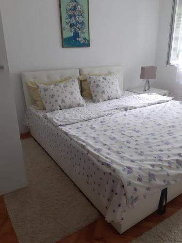 Postel nebo postele na pokoji v ubytování City ​​Apartment