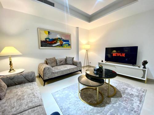 Uma área de estar em One Constitution Avenue - Apartments by Superhost