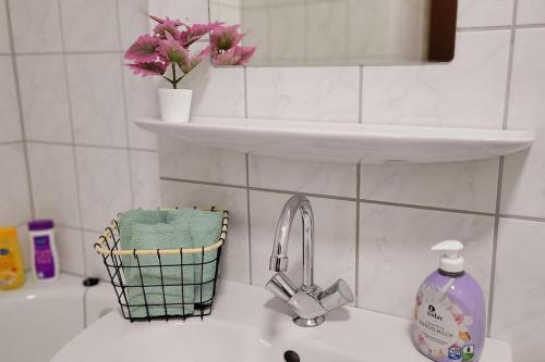 a kitchen counter with a sink and a faucet at Essen-Steele, 2-Zimmer, 4 Person in Essen