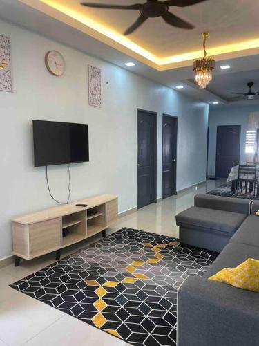 Телевизор и/или развлекательный центр в AF Homestay