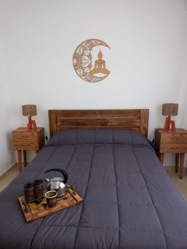 Tempat tidur dalam kamar di Sacoa Premium