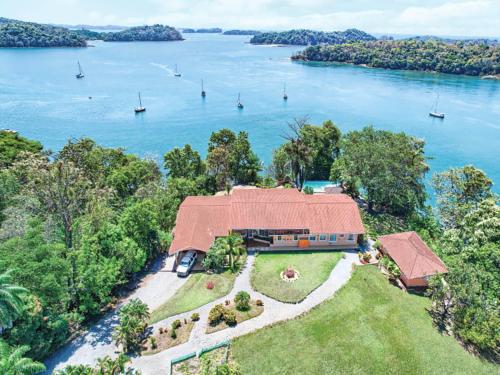 an aerial view of a house with a view of the water at Boca Chica BnB at Gone Fishing Panama Resort in Boca Chica