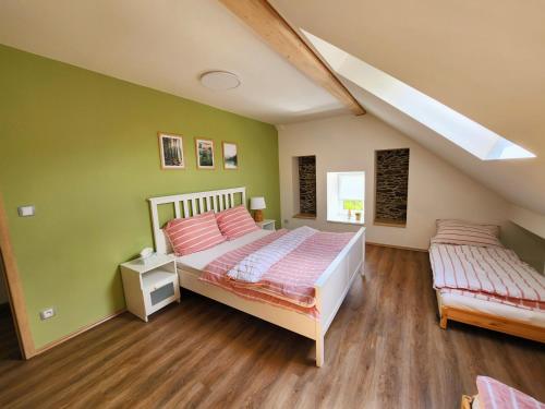 Postel nebo postele na pokoji v ubytování Apartmány u Koláčků