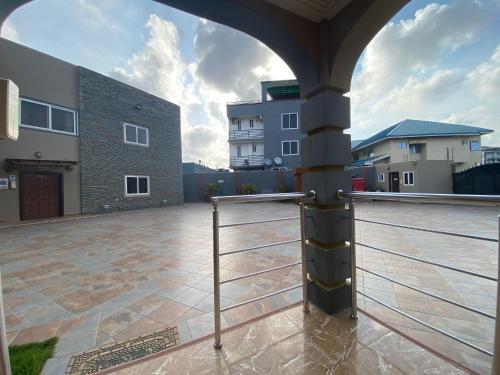 a view from a balcony of a building at Bays Lodge, Accra in Accra