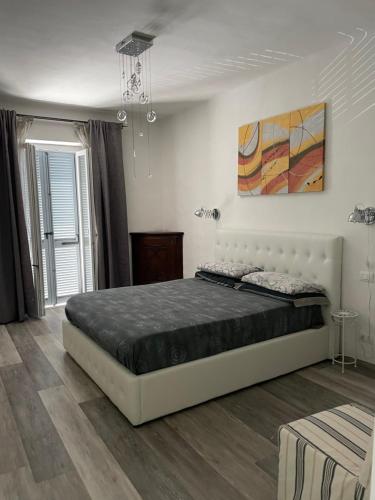 מיטה או מיטות בחדר ב-HomeSweetHome - Pavarolo ,TO, Italia