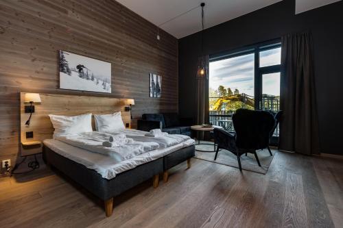 Ένα ή περισσότερα κρεβάτια σε δωμάτιο στο Trysil Alpine Lodge