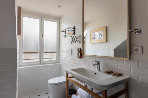 Koupelna v ubytování Hotel Pulitzer Paris