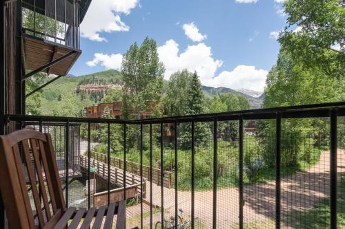 a balcony with a view of the mountains at Manitou Lodge 6 by Alpine Lodging Telluride in Telluride