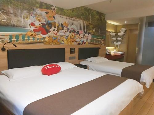 Thank Inn Plus Hotel International Resortにあるベッド