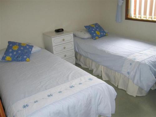 Ένα ή περισσότερα κρεβάτια σε δωμάτιο στο Great Home Close to Encounter Lakes Beach