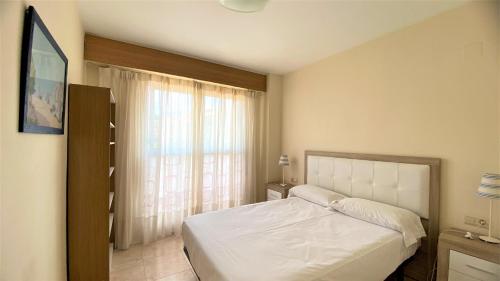 En eller flere senge i et værelse på Puerto Romano VYBDenia