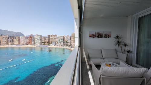 a balcony with a view of a body of water at GEMELOS sea front apartment in Benidorm