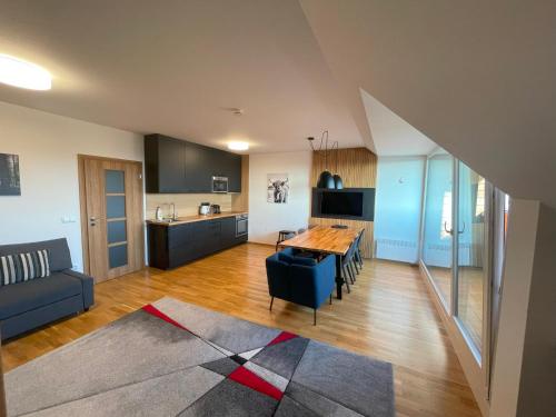 TV a/nebo společenská místnost v ubytování Apartmán O18 - Kleč