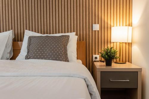 Postel nebo postele na pokoji v ubytování Zona Optimizma accommodation & SPA