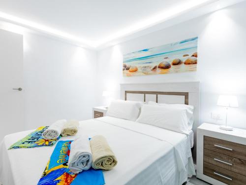 Postel nebo postele na pokoji v ubytování 101 Playa Honda, Playa de las Americas
