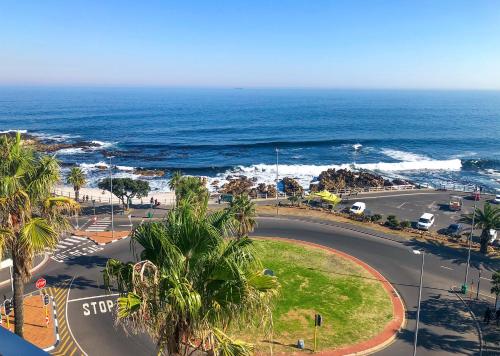 an aerial view of a street and the ocean at Peninsula All Suite Hotel by Dream Resorts in Cape Town
