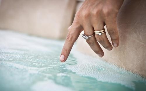 a woman wearing a engagement ring on her finger at Casetta Zio Franco in Polignano a Mare