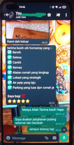 a screenshot of the doughnut shop on a cell phone at Homestay Biru Chekgu in Kajang