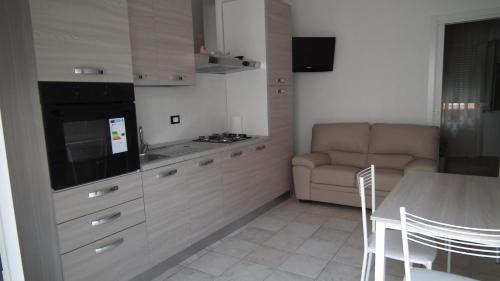 Kuchyň nebo kuchyňský kout v ubytování Condominio Belletti