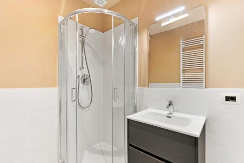 a bathroom with a shower and a sink at Alessia's Flat- Naviglio Grande in Buccinasco