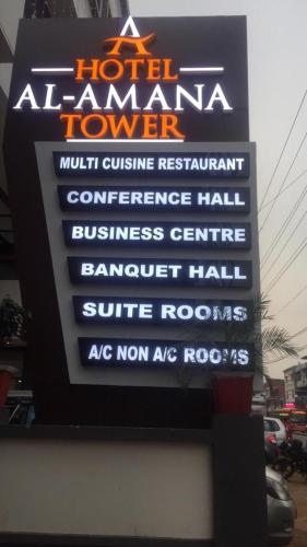 a sign for a hotel atlanta tower with a sign for a hotelana at HOTEL AL AMANA TOWER in Kondotti