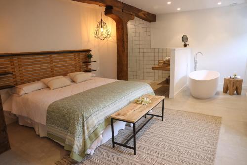 Postel nebo postele na pokoji v ubytování GOIZARTE Apartamentos turísticos rurales.