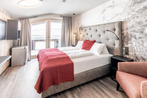Postel nebo postele na pokoji v ubytování Hotel Astrid - inklusive kostenfreier JokerCard