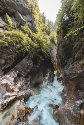 a river flowing through a rocky canyon at Ferienwohnung Dohr in Kundl