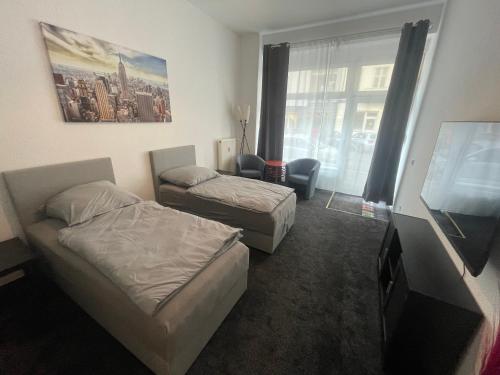 Säng eller sängar i ett rum på Berlinhome Apartment Friedrichshain