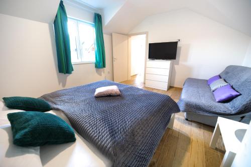 Cama o camas de una habitación en Bumerang