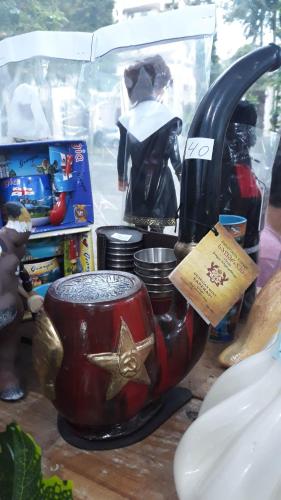 a figurine of a coffee pot with a star on it at White Hotel in K'obulet'i