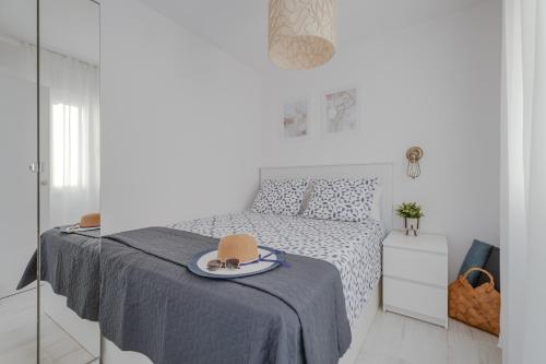 Ένα ή περισσότερα κρεβάτια σε δωμάτιο στο Stay in Torrevieja Cozy City & Sea
