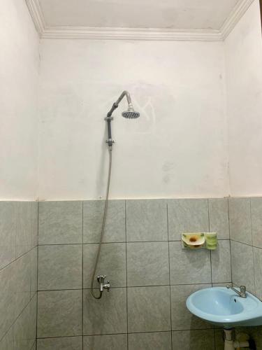 Ένα μπάνιο στο Penginapan Sedap Malam